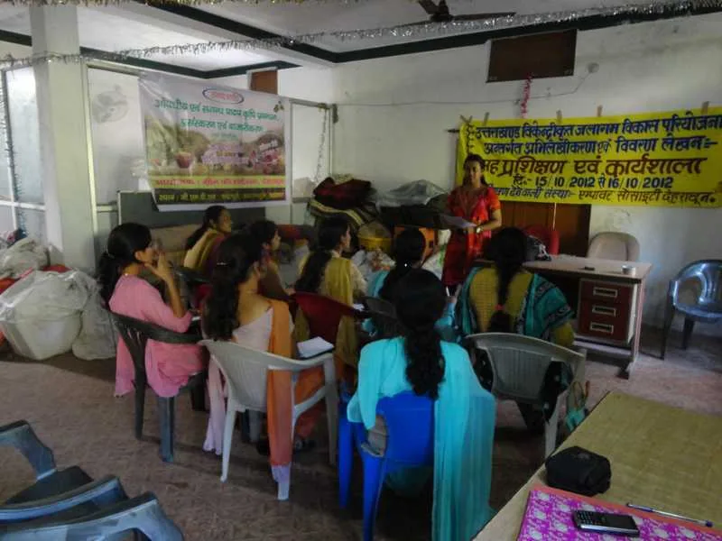 Participants listening during a SLEM capacity-building workshop